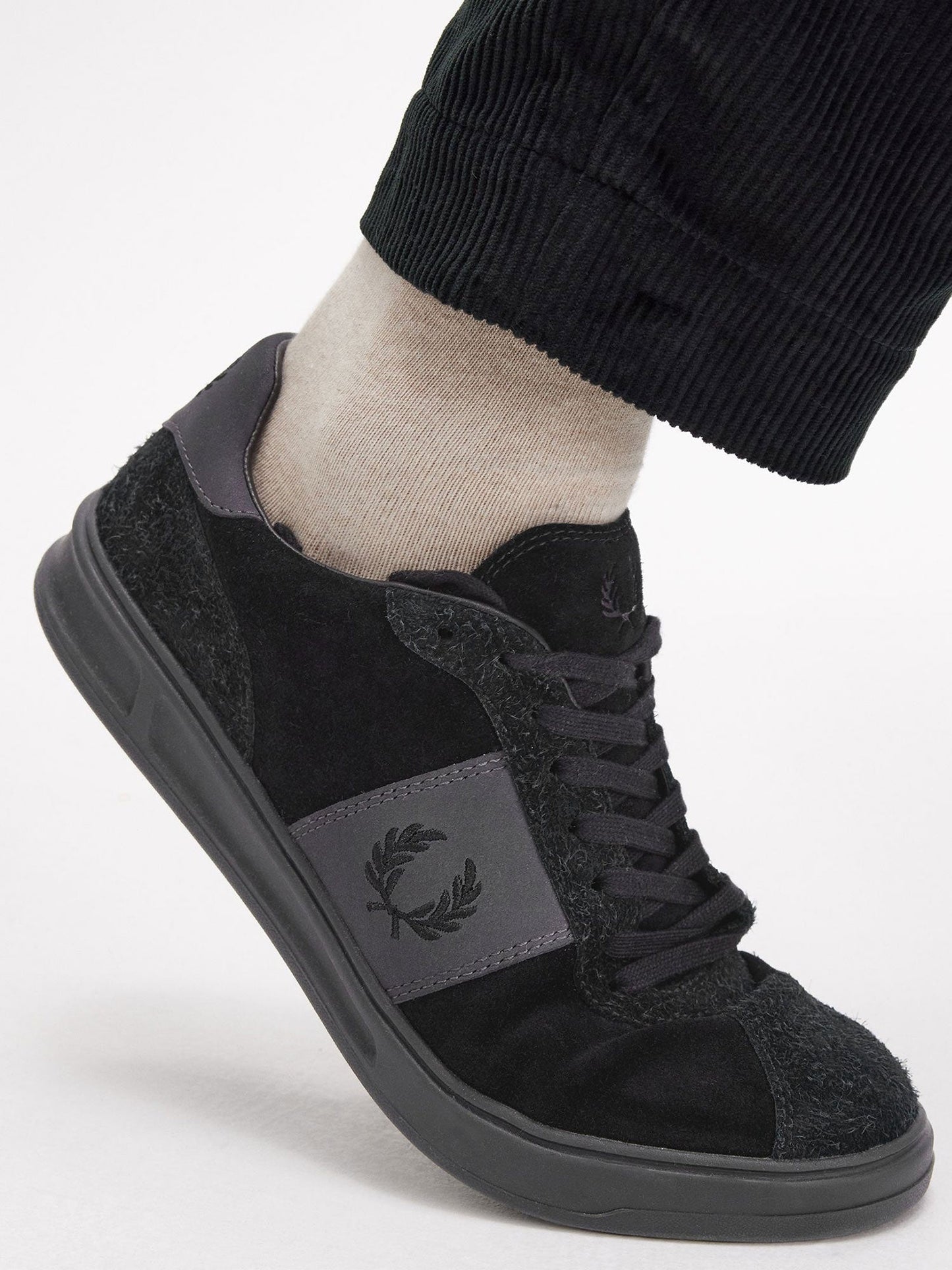 Suede sneakers with iconic embroidery