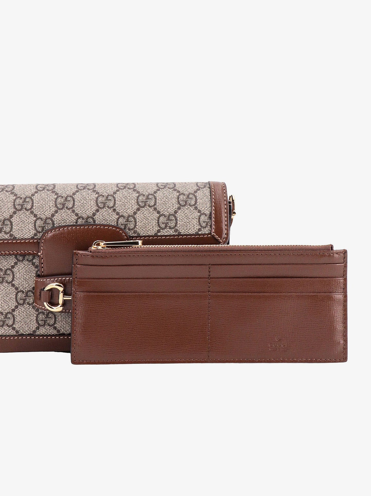 Borsa a spalla in tessuto gg supreme e pelle con iconico morsetto in metallo