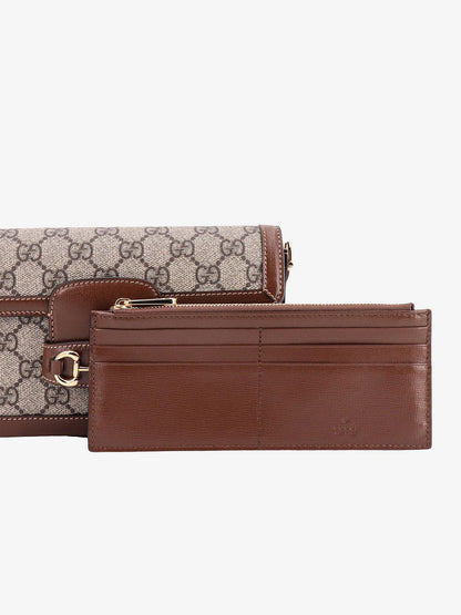 Borsa a spalla in tessuto gg supreme e pelle con iconico morsetto in metallo thumbnail