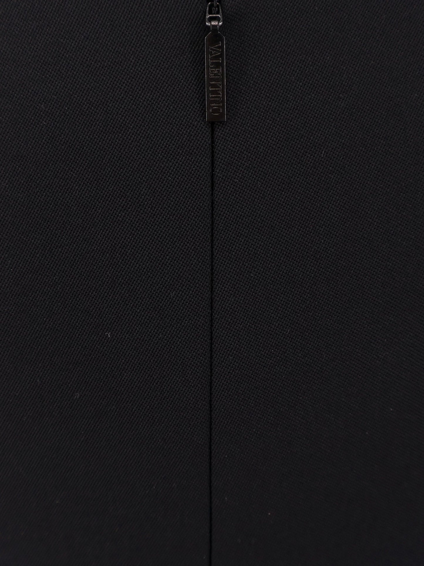 Virgin wool longuette skirt with slits and silk lining