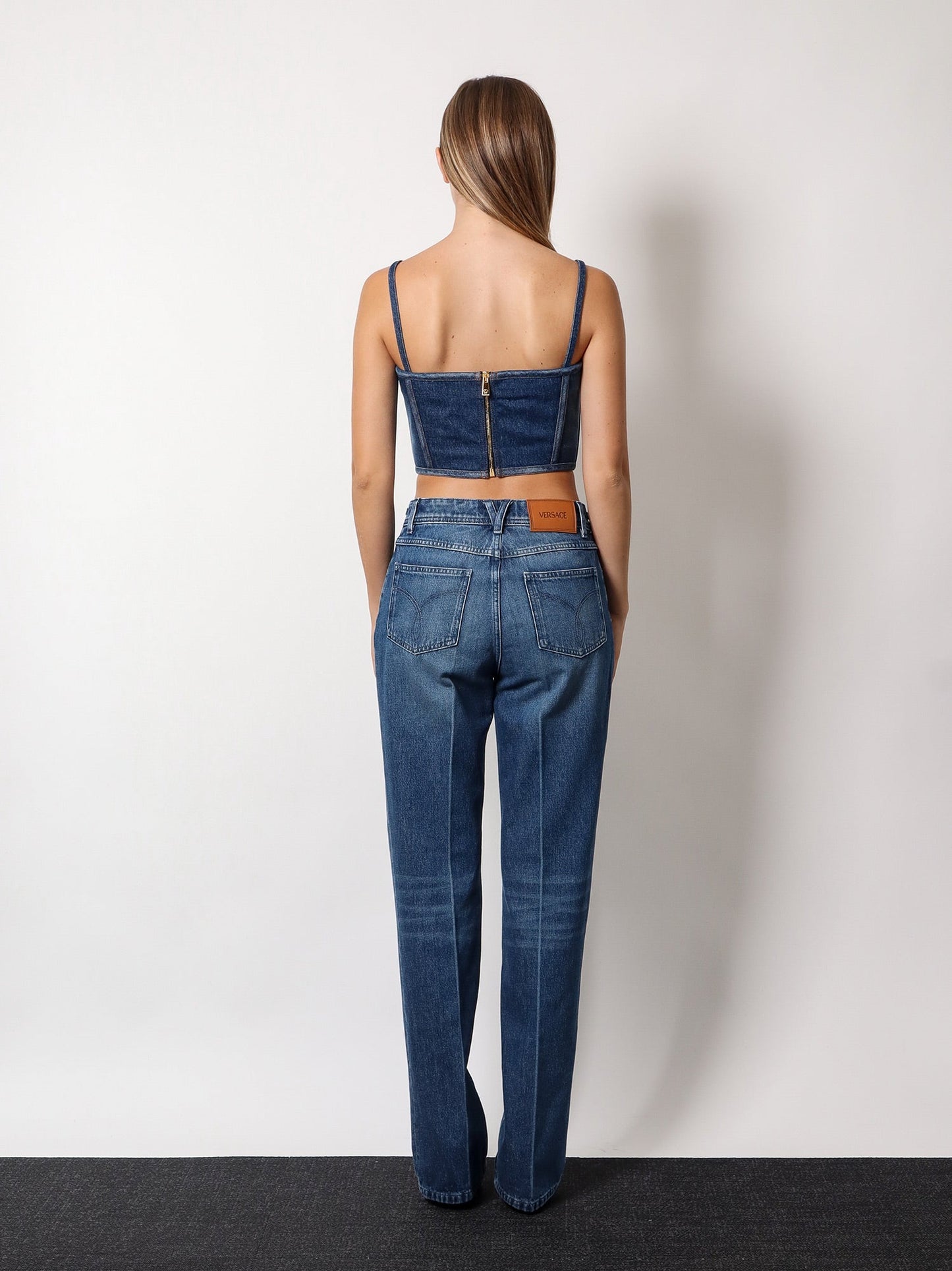 Cotton jeans with 95' medusa detail