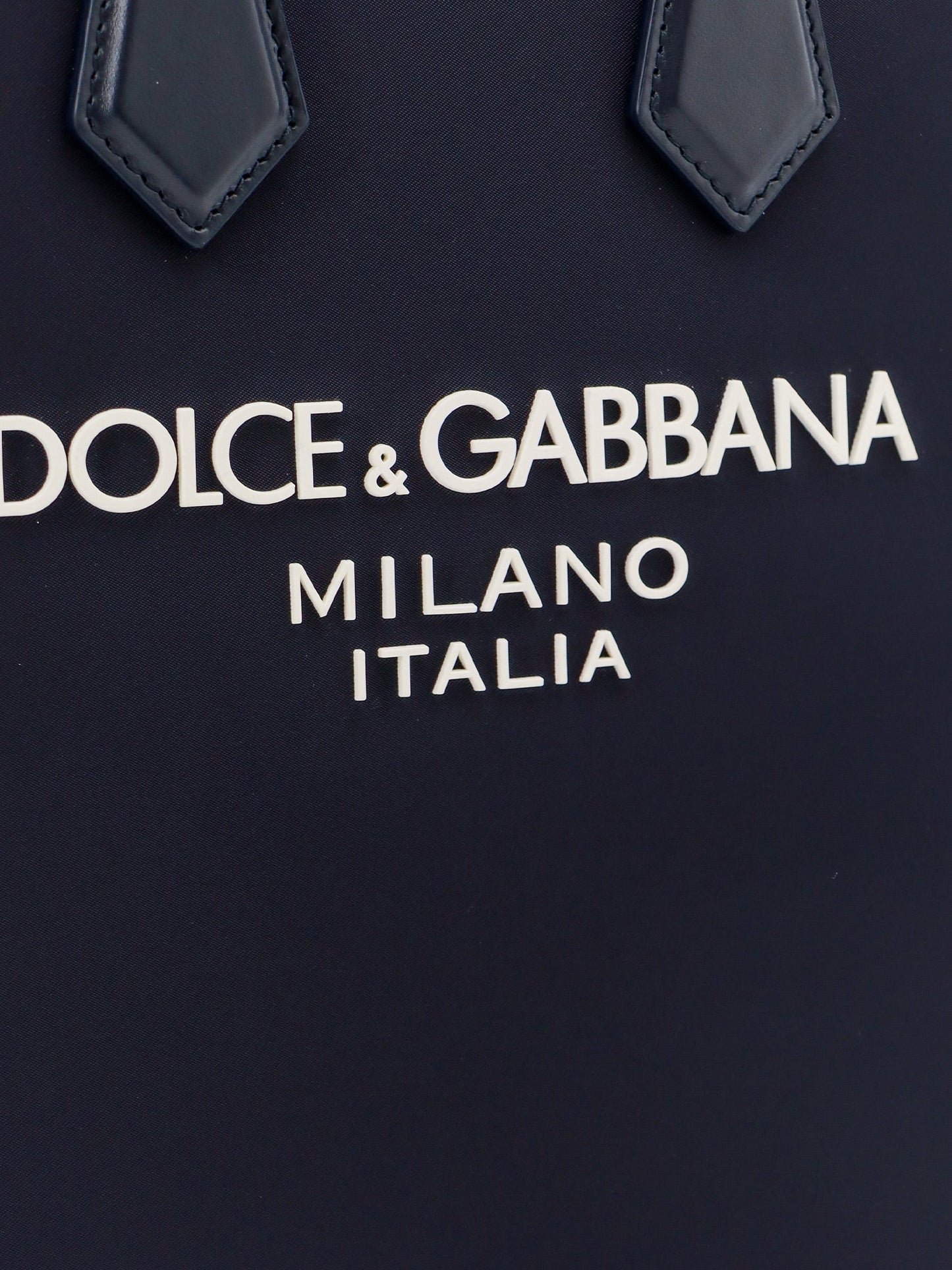 Nylon and leather handbag with embossed logo