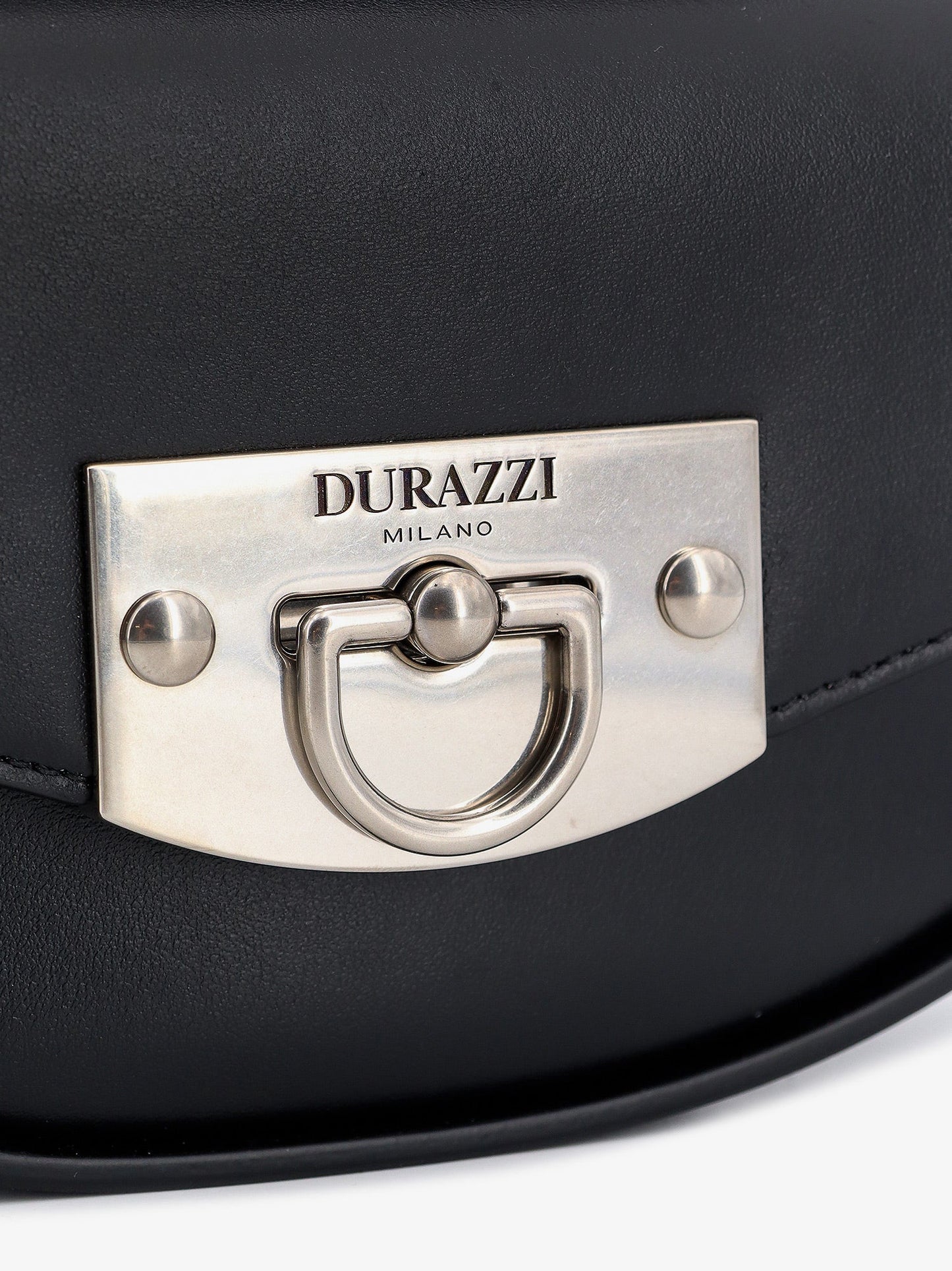 Leather handbag with engraved logo