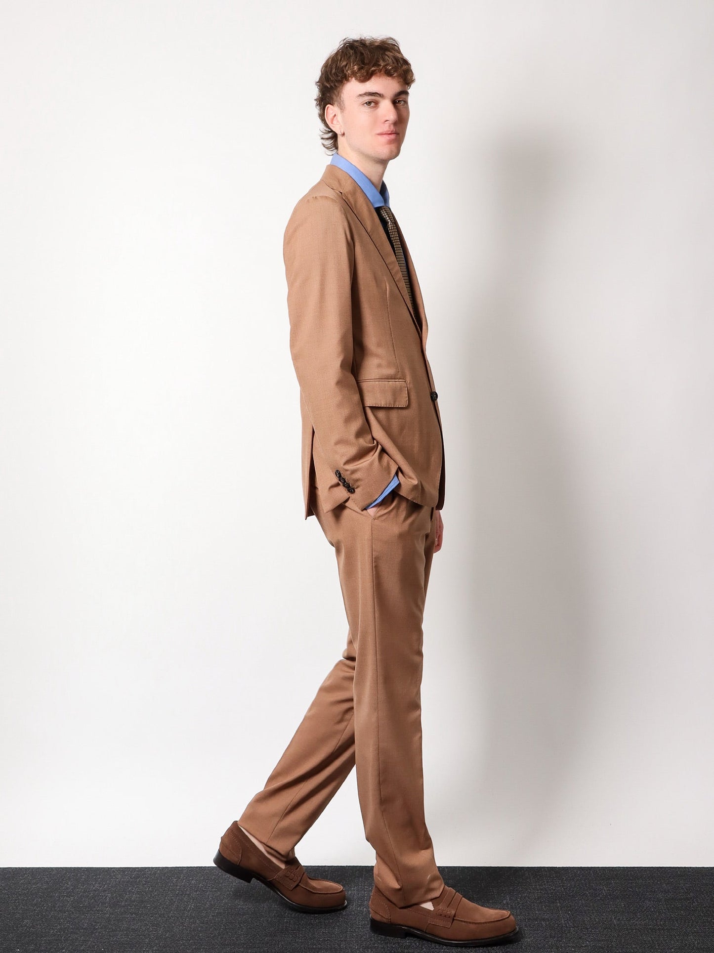 Virgin wool and silk suit with iconic metal detail