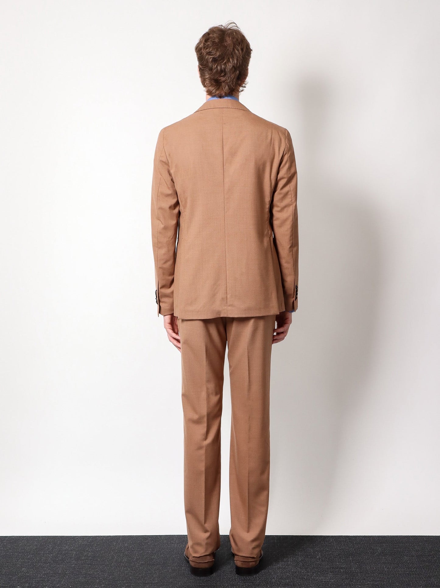 Virgin wool and silk suit with iconic metal detail