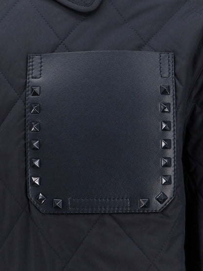 Padded and quilted nylon jacket with iconic studs thumbnail