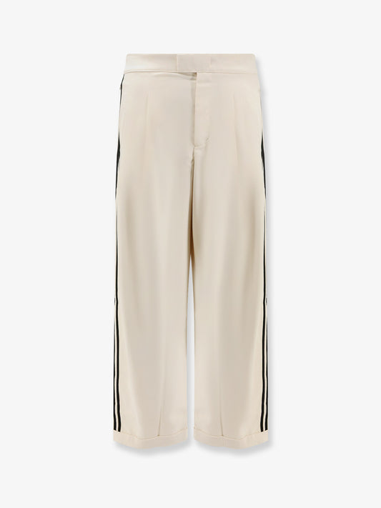 Recycled nylon trousers with iconic detail on the side