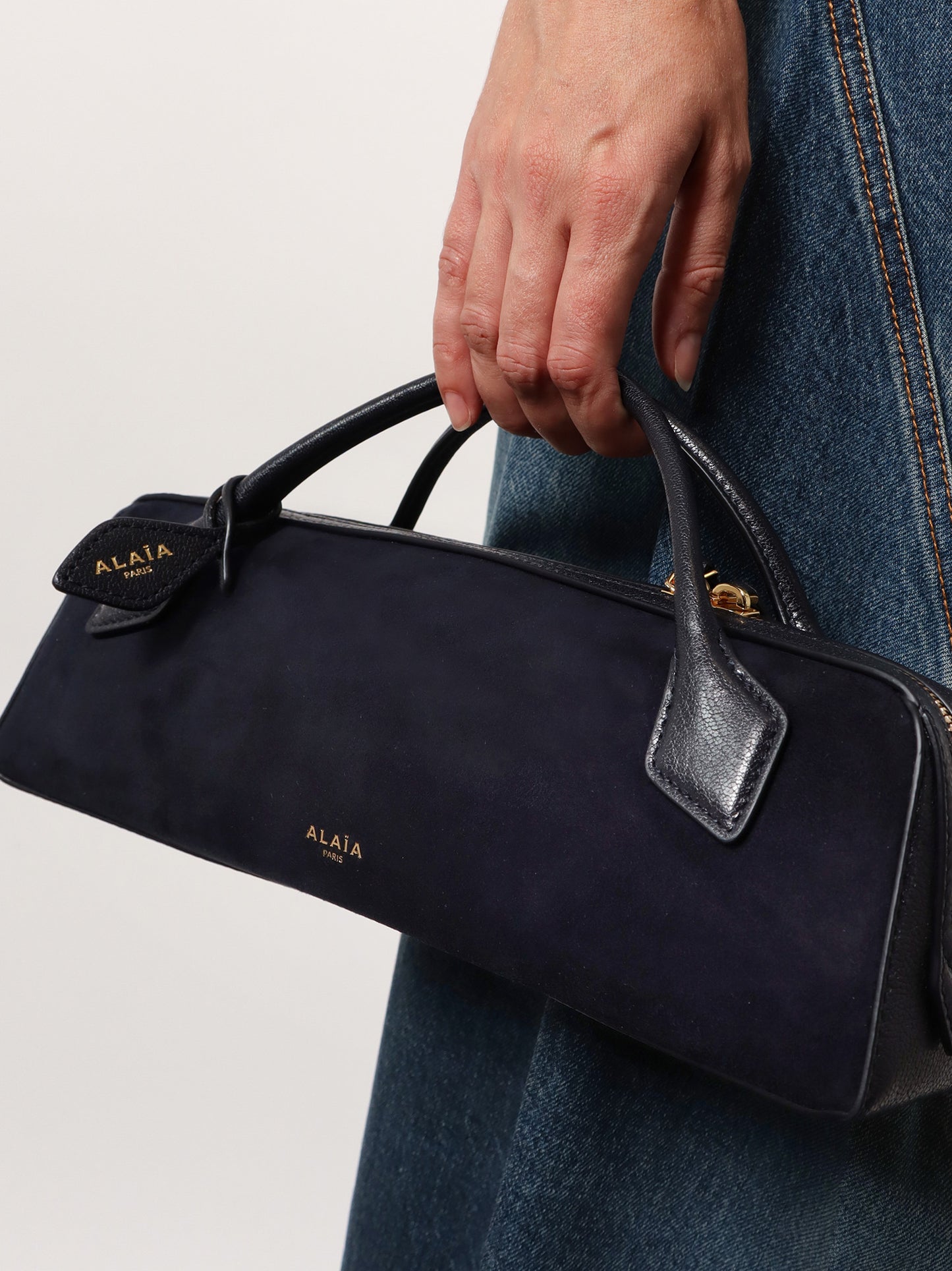 Clutch Le Teckel suede handbag