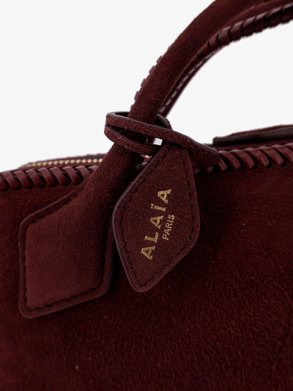 Clutch Le Teckel suede handbag thumbnail