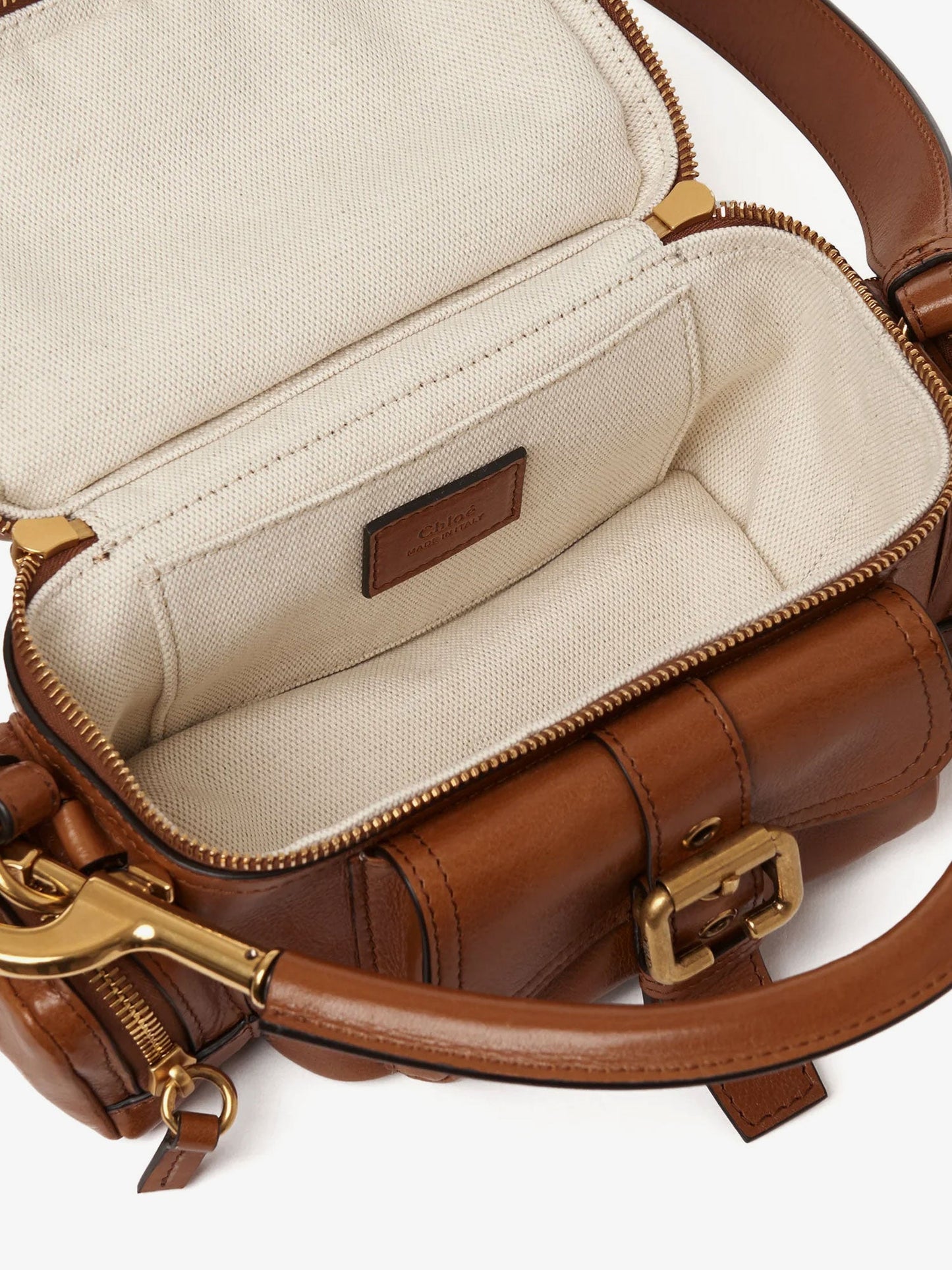 Small double carry leather bag with multipocket detail