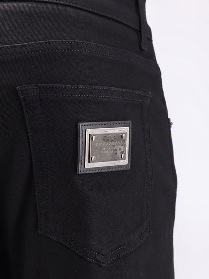 Slim black denim trousers thumbnail