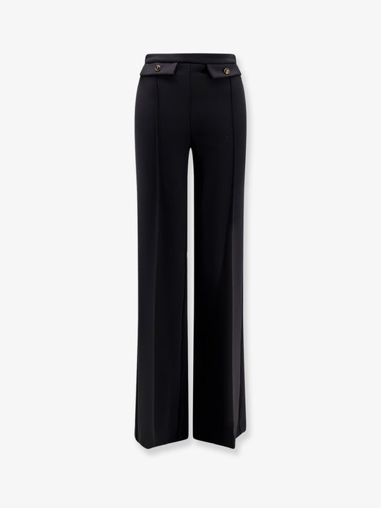 Trousers with double logoed button