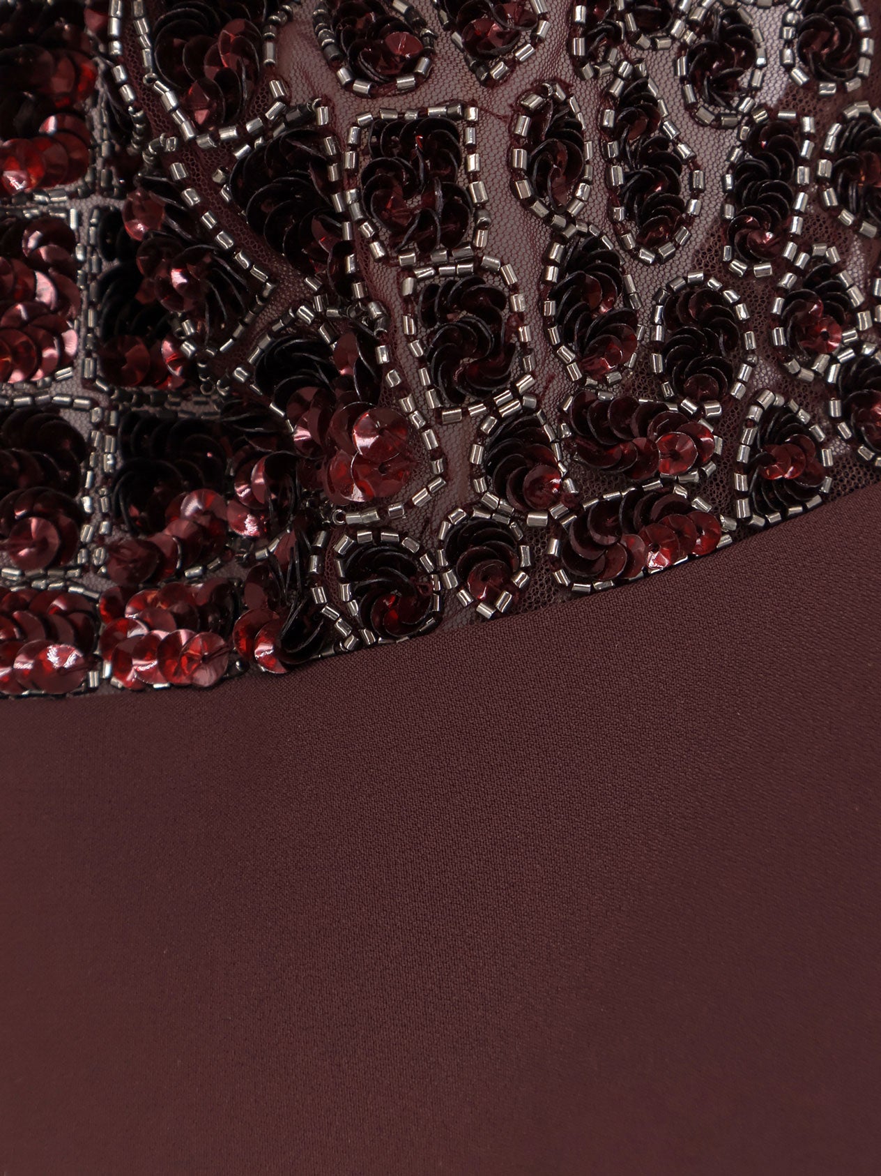 Satin suit with sewuins on the top