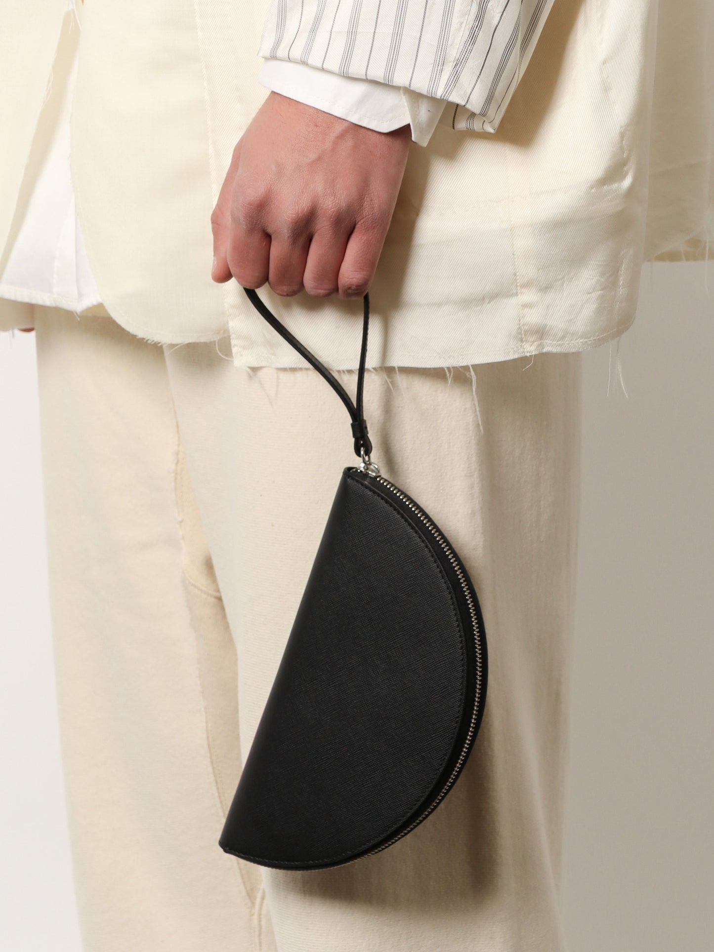 Pochette in pelle con iconico dettaglio four stitches