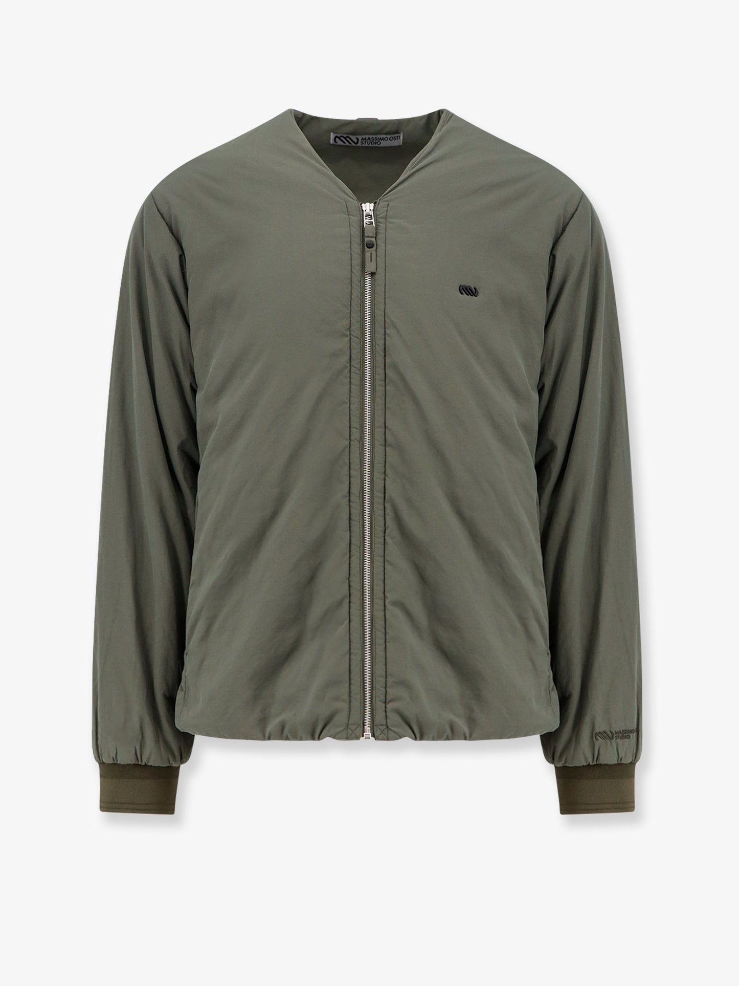 Nylon jacket with metal logo patch on the front