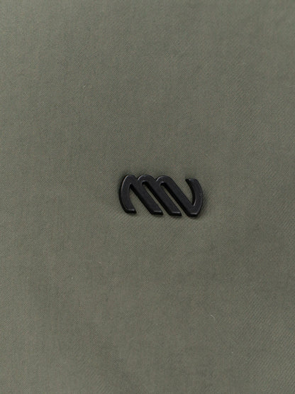 Nylon jacket with metal logo patch on the front thumbnail