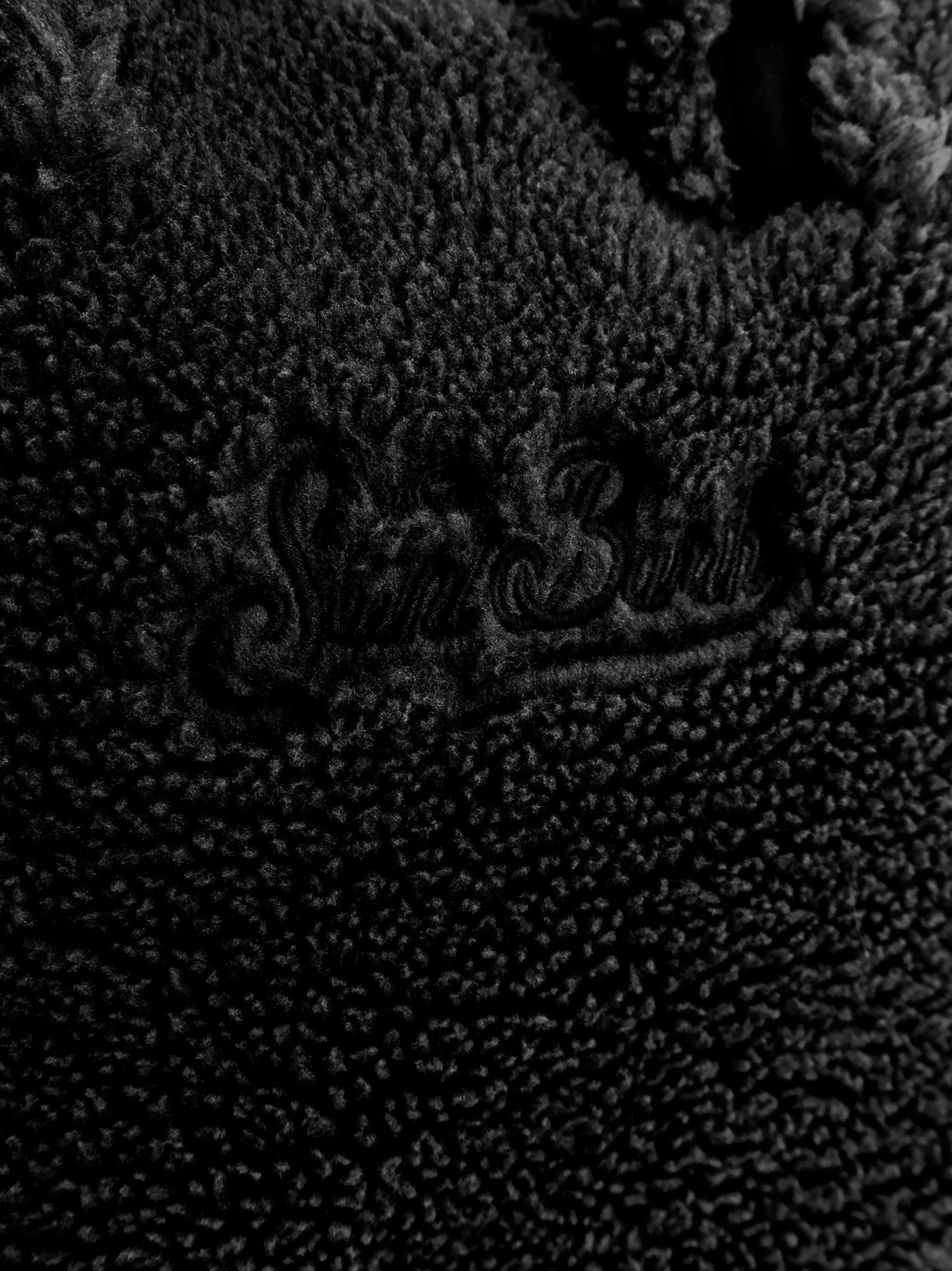 Colette Teddy crossbody bag with logo on the front