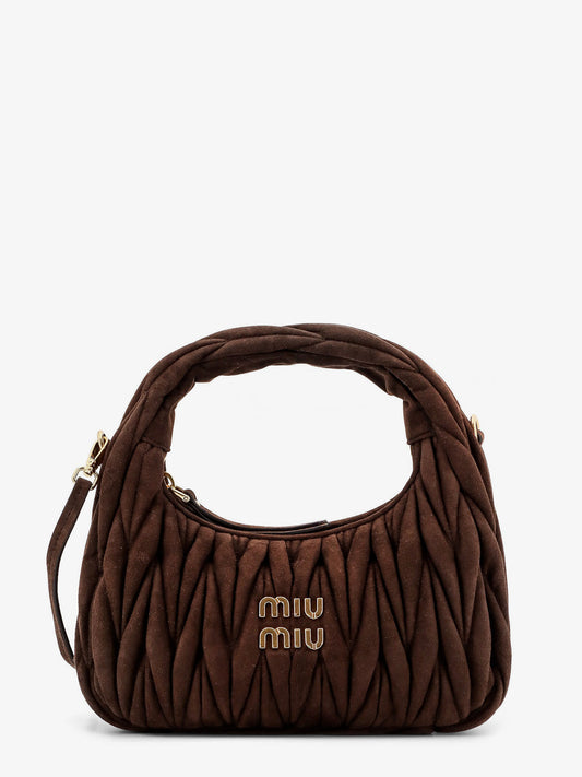 Wander matelassé suede shoulder bag