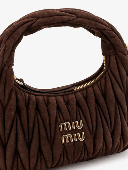 Wander matelassé suede shoulder bag thumbnail