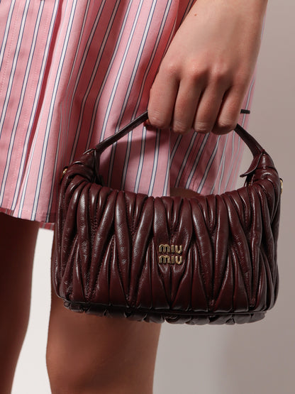 Matelassé leather handbag thumbnail