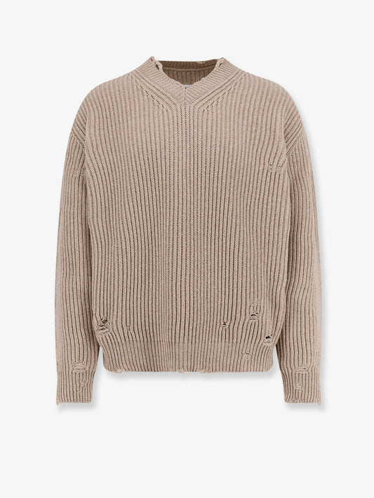Wool blend sweater with distressed effect