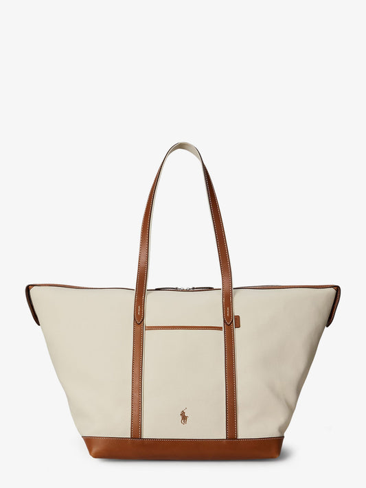 Canvas travel bag with leather profiles