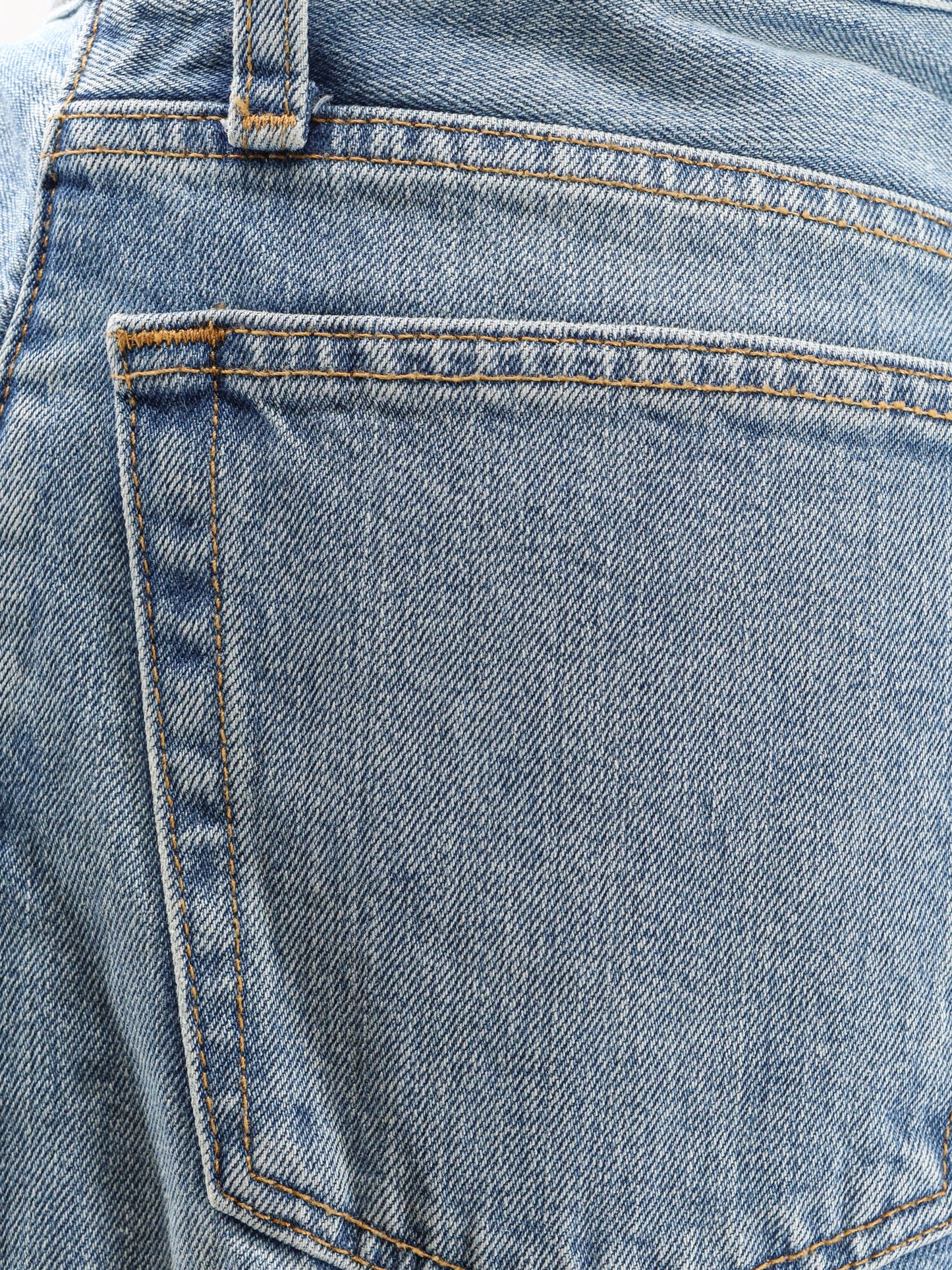 Jeans with raw cut cuff