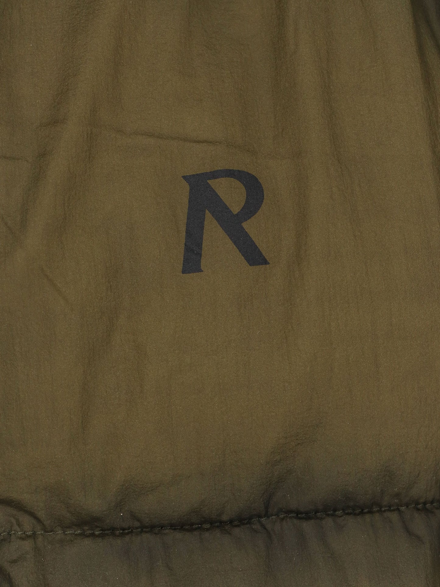 Padded and quilted down jacket