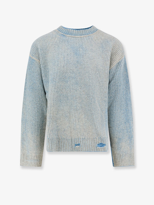 Reversible wool sweater with distressed effect