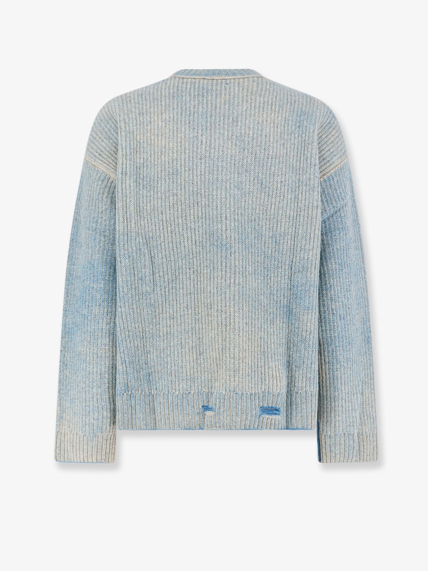 Reversible wool sweater with distressed effect