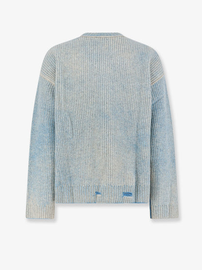 Reversible wool sweater with distressed effect thumbnail