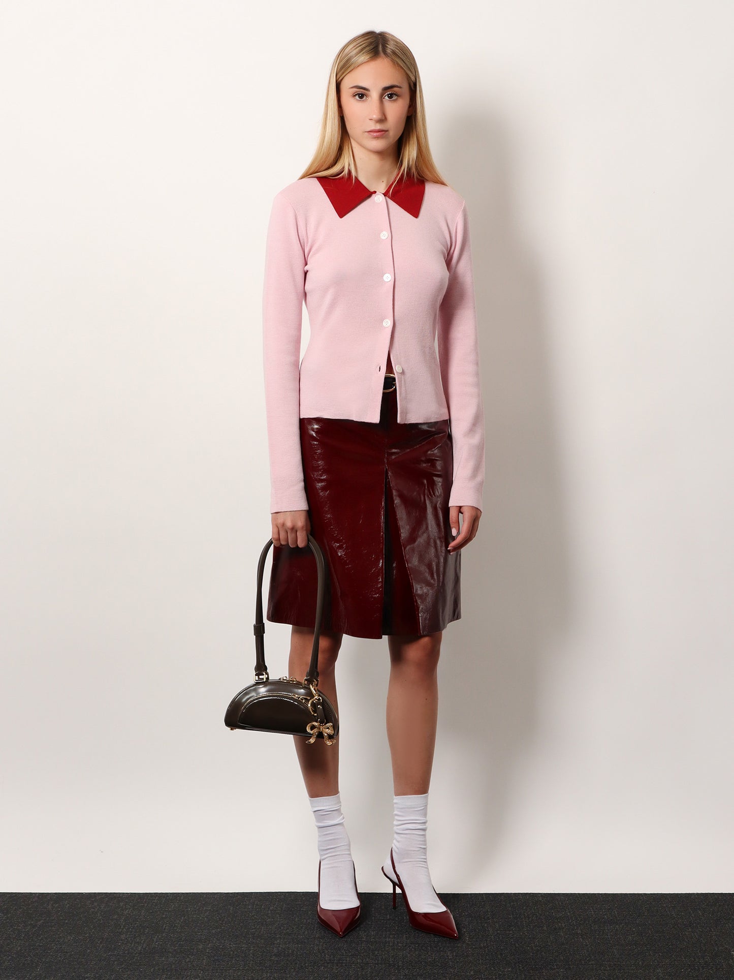 Leather shoulder bag with charms