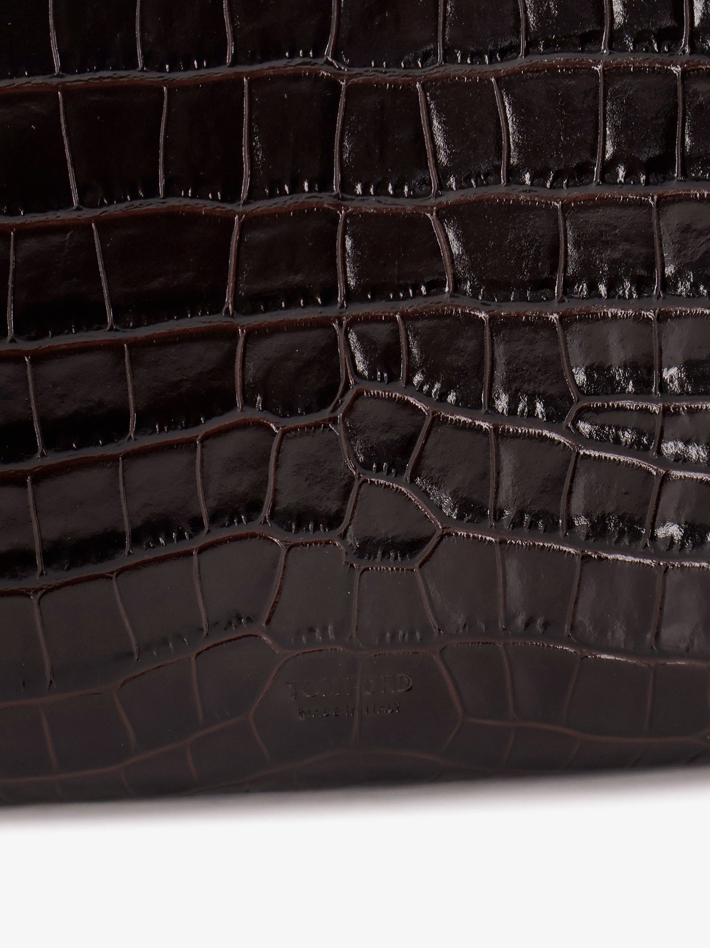 Crocodile-print leather clutch bag