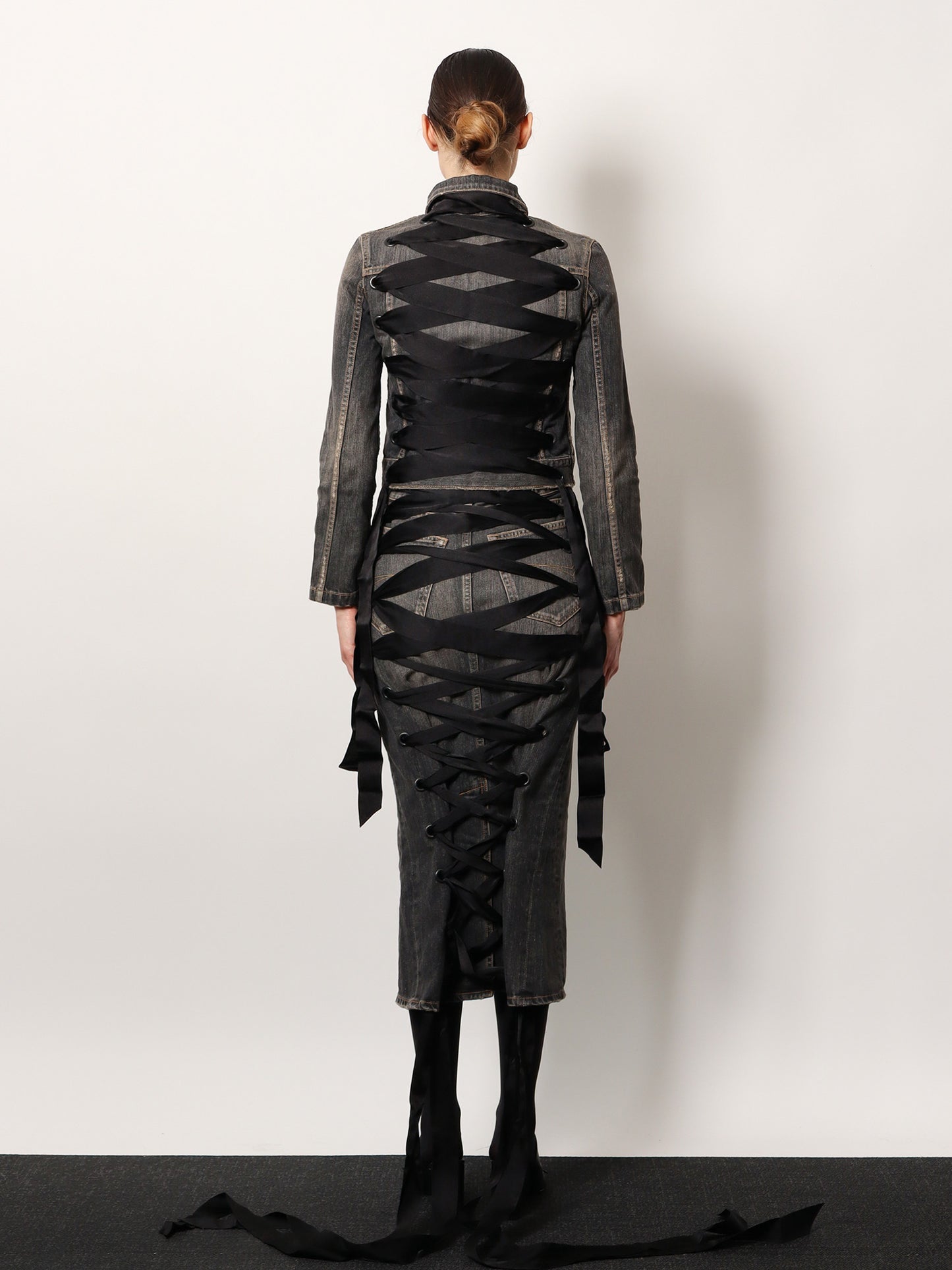 Denim skirt with laces interwining