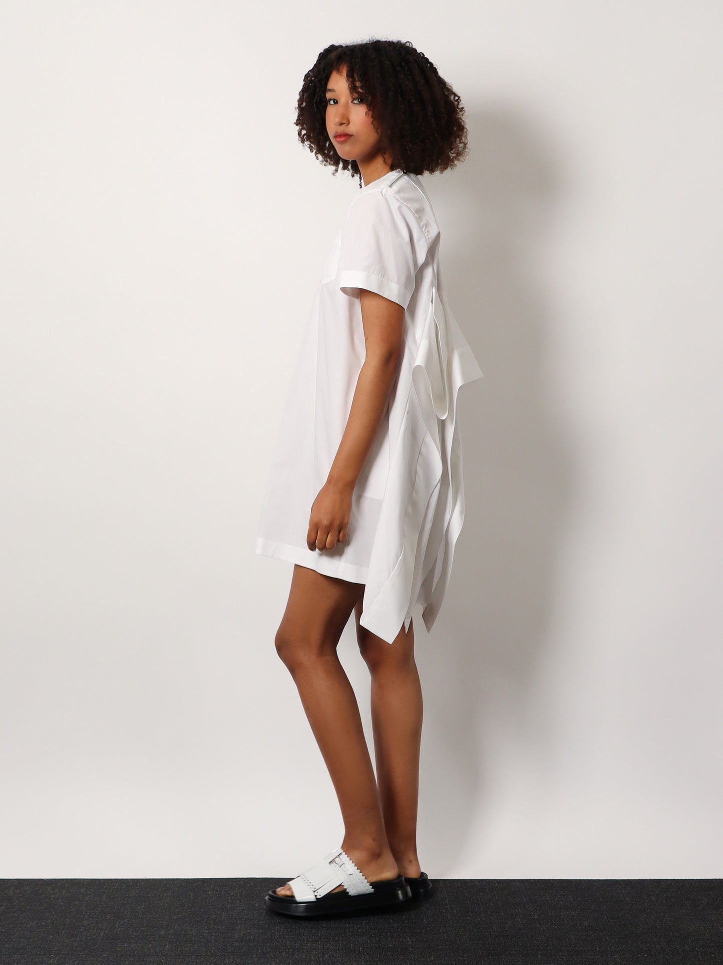 Dress with draped cotton inserts on the back