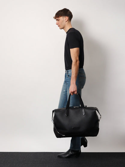 Leather duffle bag with suede inserts and logo patch thumbnail