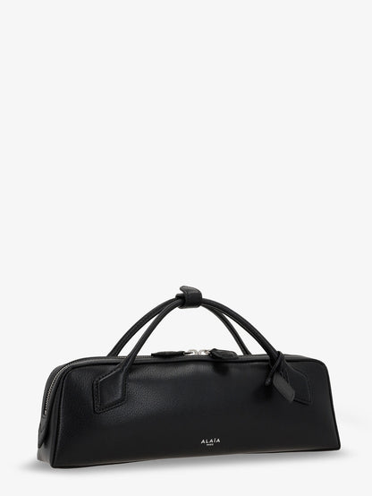 Le Teckel suede clutch bag thumbnail