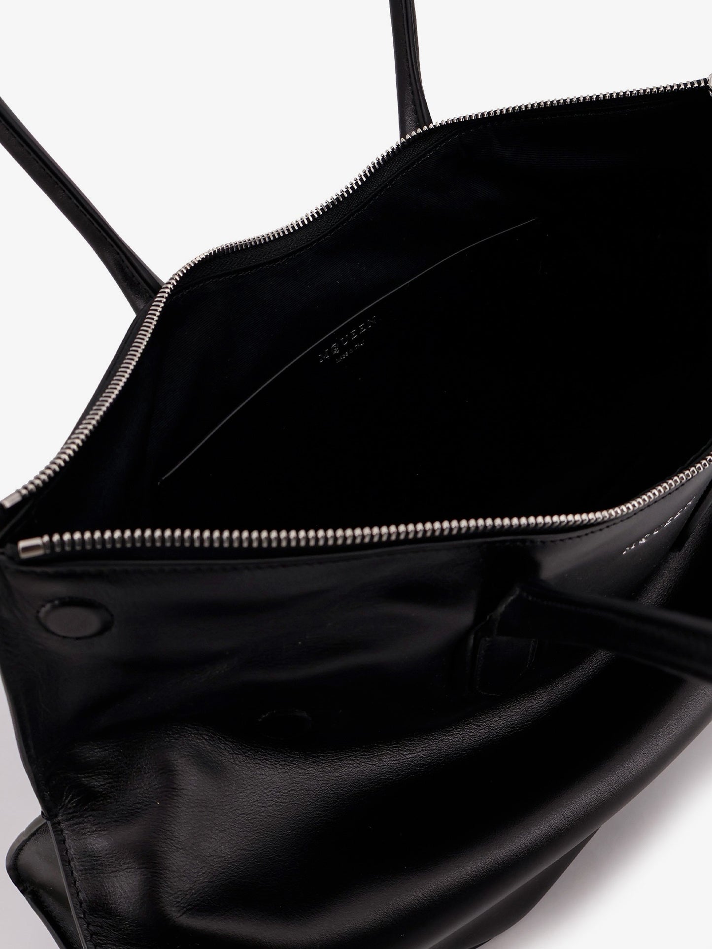 Manta leather shoulder bag with all-over metal details