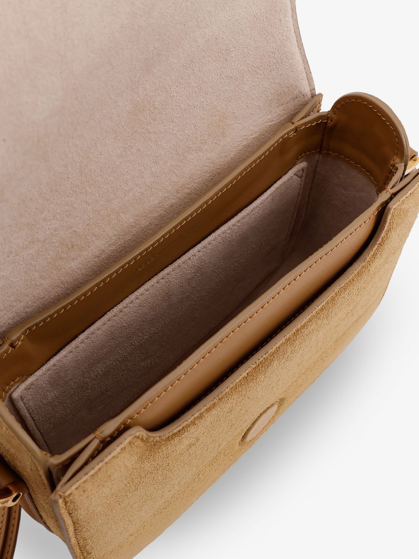 Suede shoulder bag with metal logo on the front