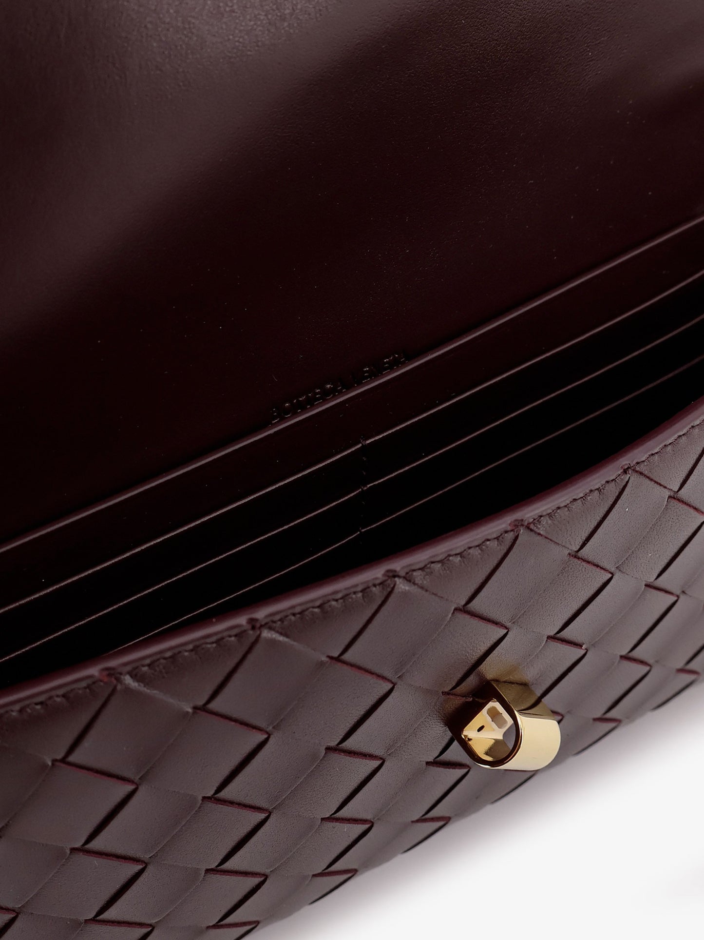 Andiamo Clutch in pelle con motivo intrecciato