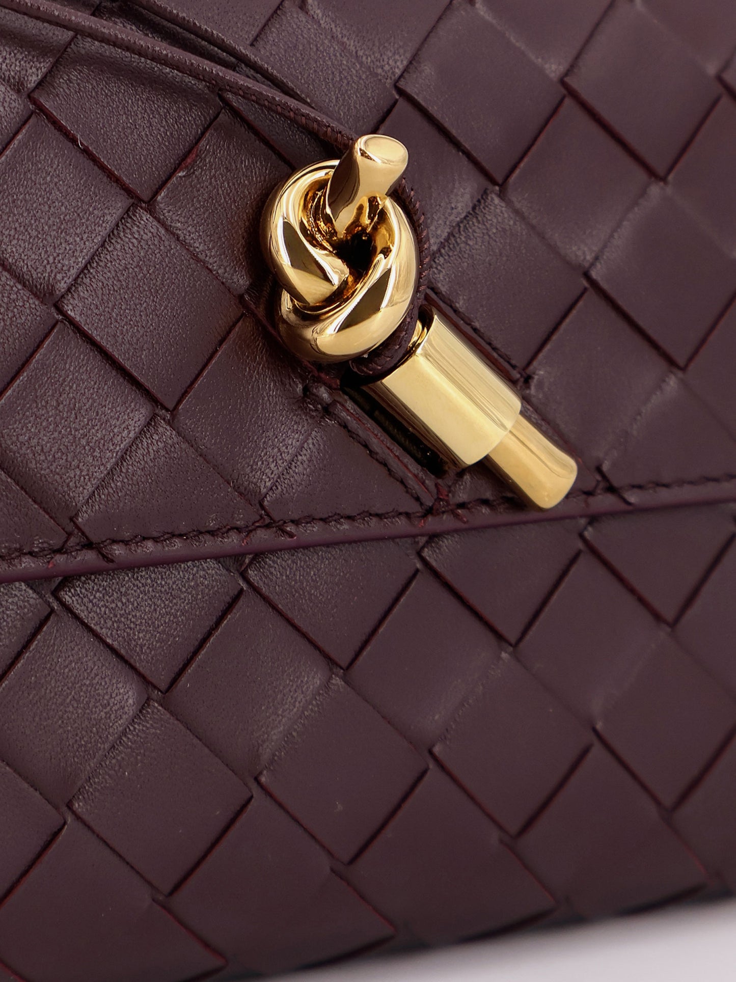 Andiamo Clutch in pelle con motivo intrecciato