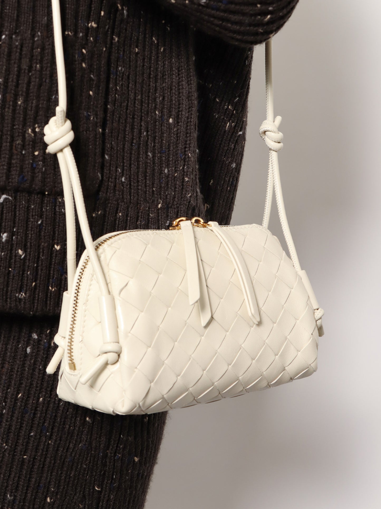 Concert Pouch leather crossbody bag with Intrecciato motif