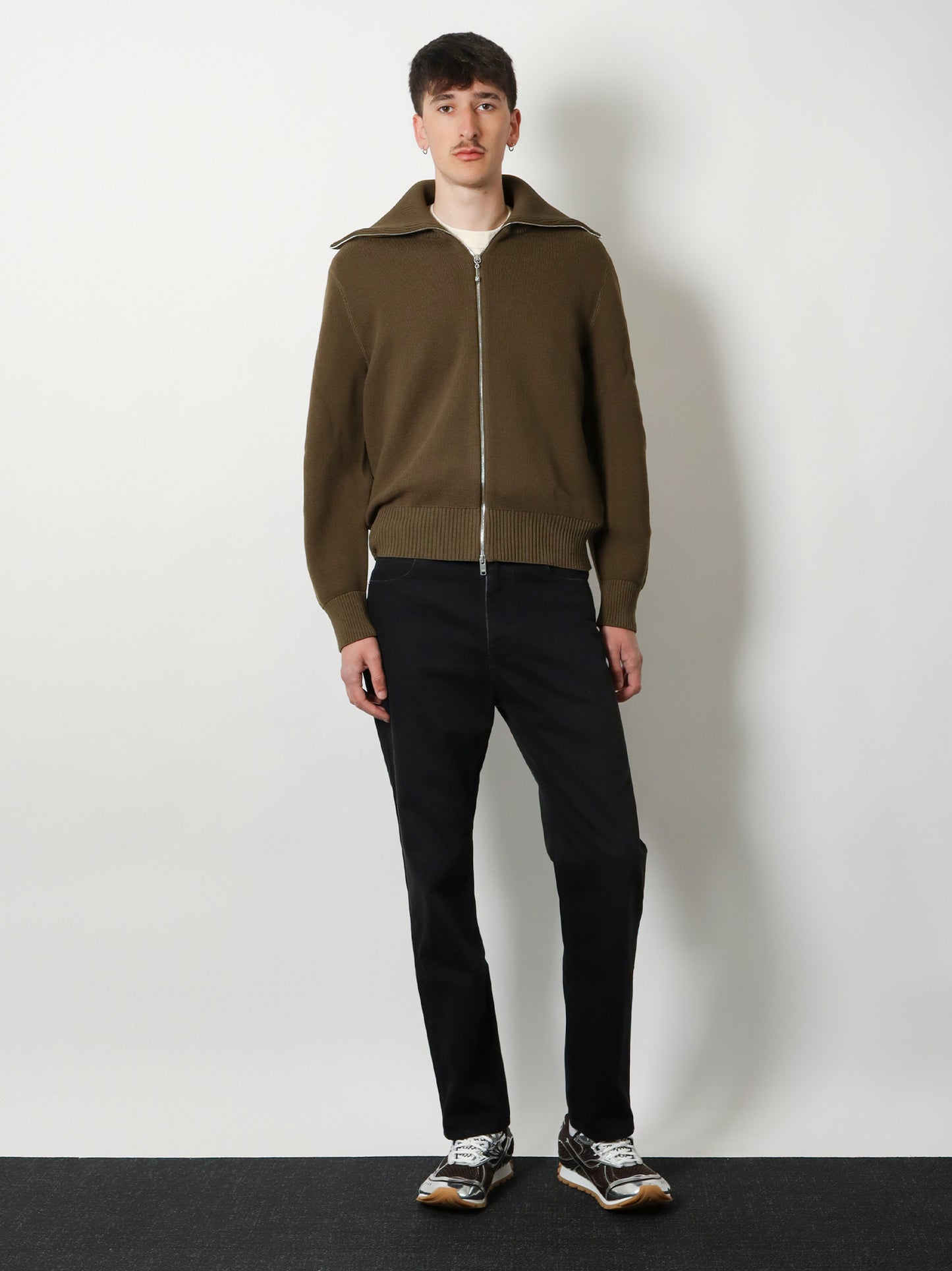 Black denim trousers with back leather patch