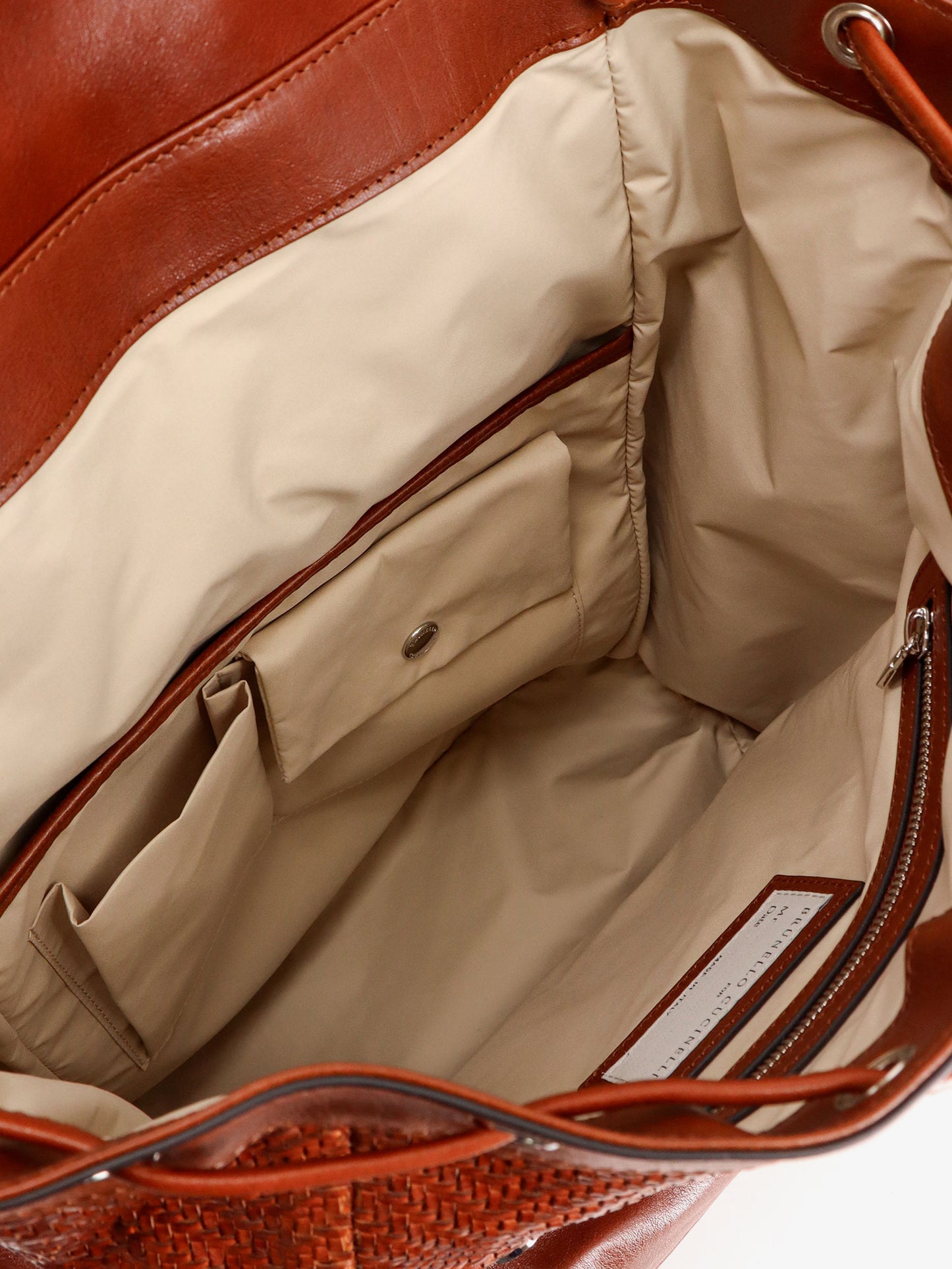 City leather backpack with engraved lettering logo