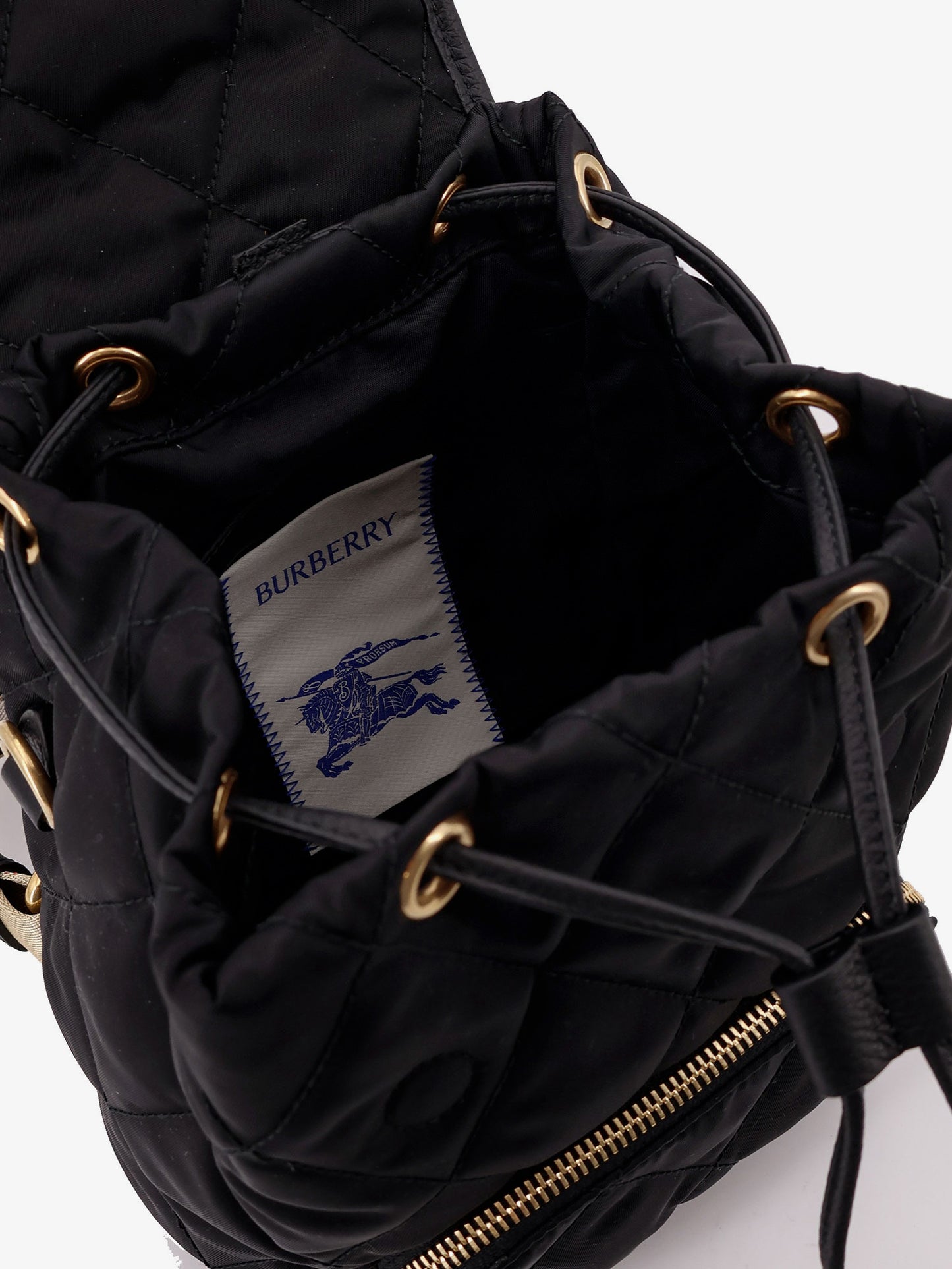 Nylon backpack with leather logo patch