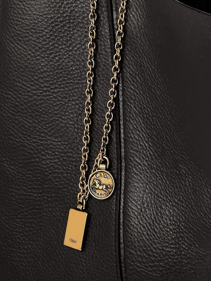 Spin leather shoulder bag with lettering logo on the front thumbnail