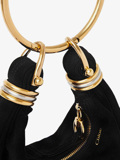 Bracelet suede crossbody bag thumbnail