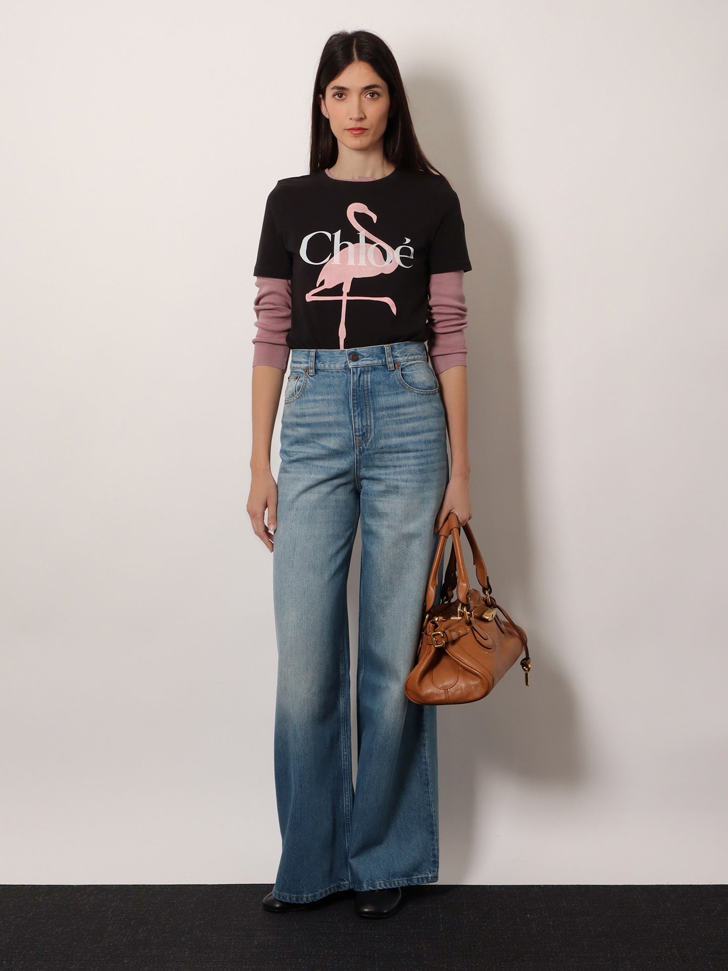 Jeans in blue denim con etichetta logo posteriore