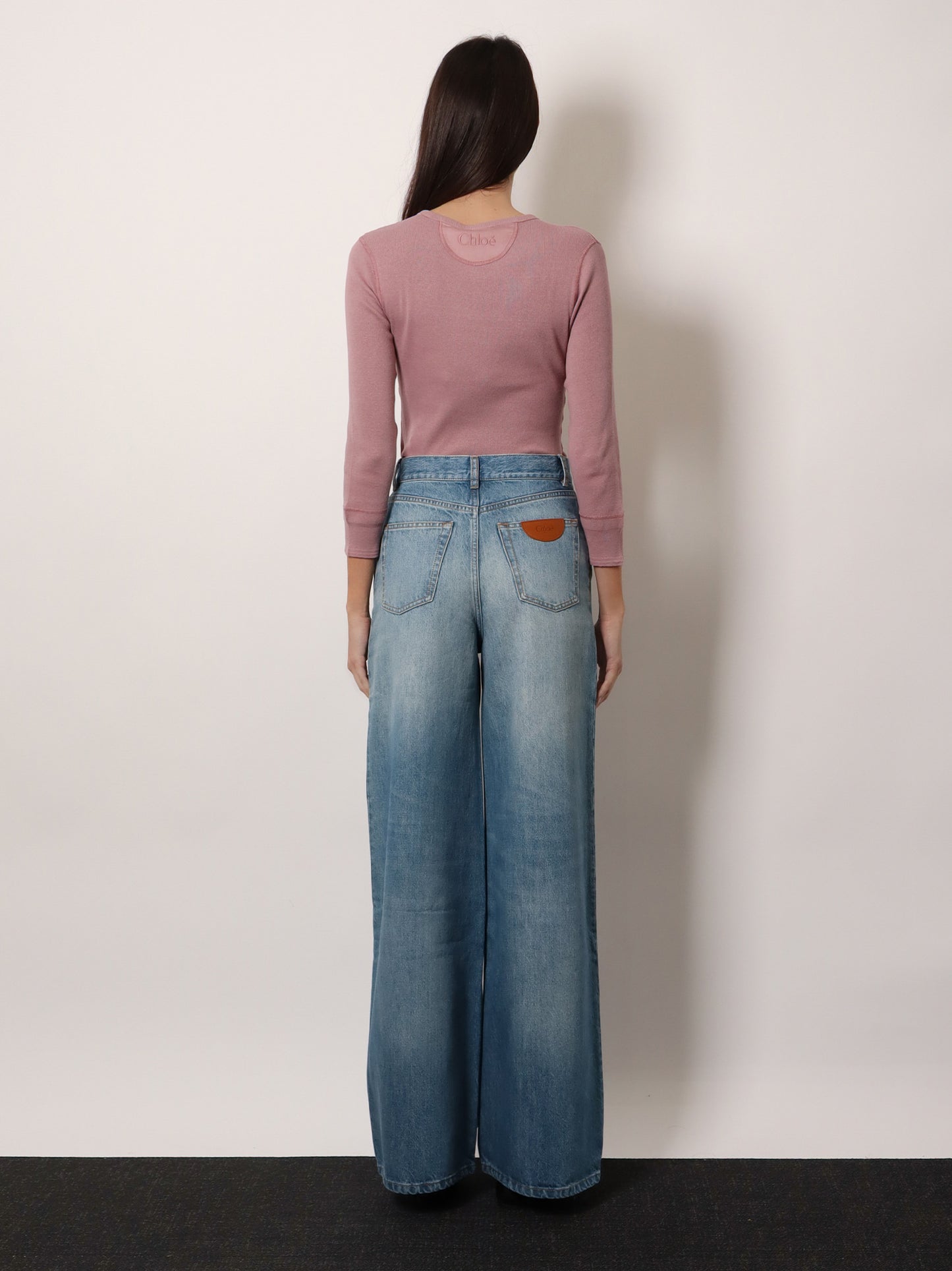 Jeans in blue denim con etichetta logo posteriore