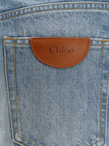 Blue denim jeans with logo label on the back thumbnail